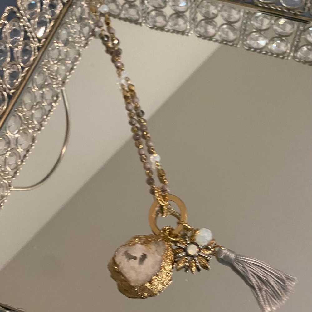 c1946 Gold and White Beaded Necklace with Tassel, stone and starburst charms
